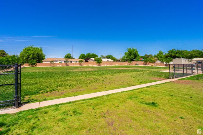 View of yard with a gate | Image 64