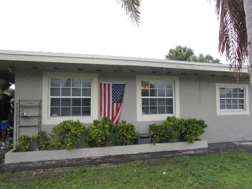 1145 W 27th St, Riviera Beach, FL, 33404-4143 | Card Image