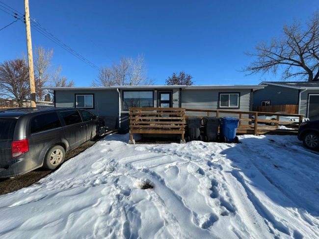 1203 42 Avenue N, Home with 3 bedrooms, 1 bathrooms and 6 parking in Lethbridge AB | Image 1