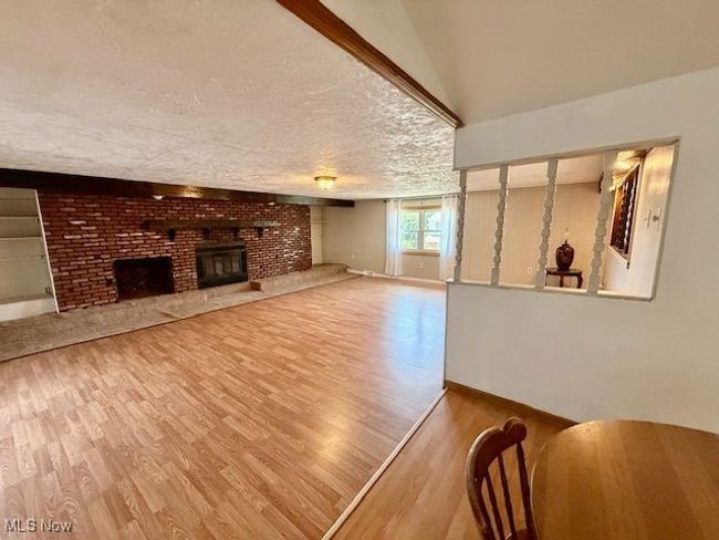 Spare room with light wood-style floors and baseboards | Image 12