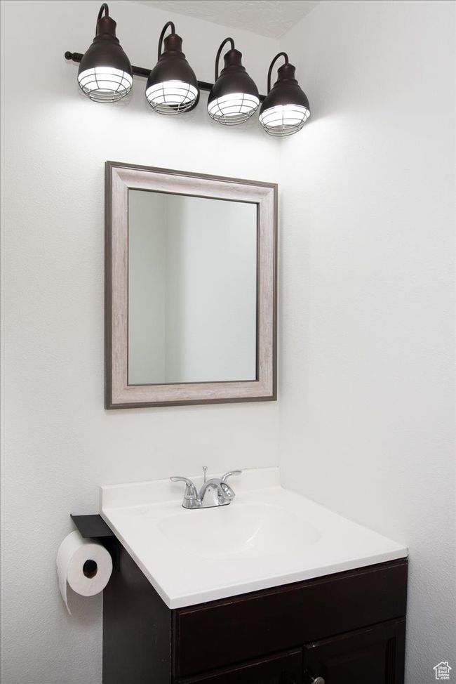 Bathroom featuring vanity | Image 10