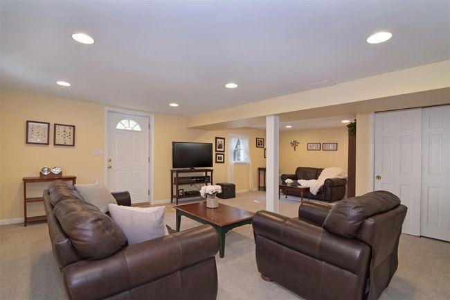 Living room with recessed lighting, baseboards, and light carpet | Image 17