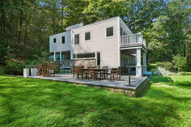 Summer view. Wrap around patio. | Image 28