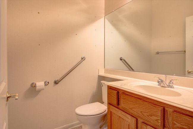 Half bathroom with vanity and toilet | Image 25