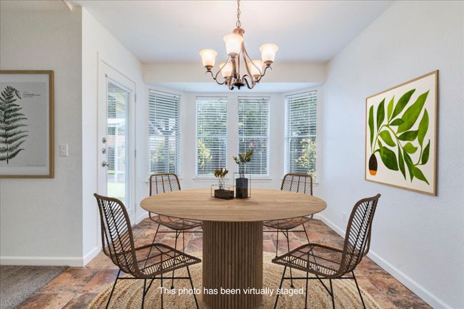 Dining area virtually staged | Image 17