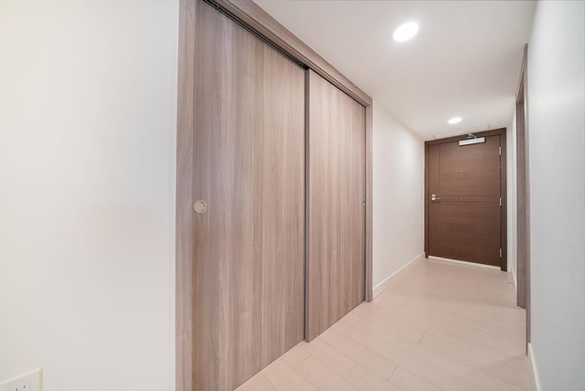 Hall featuring baseboards, recessed lighting, and light wood-type flooring | Image 15
