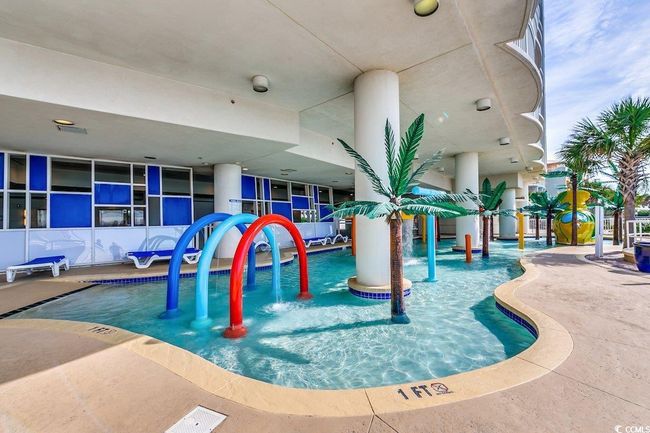 Indoor pool with a water play area | Image 21
