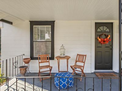 View of exterior entry featuring a porch | Image 2