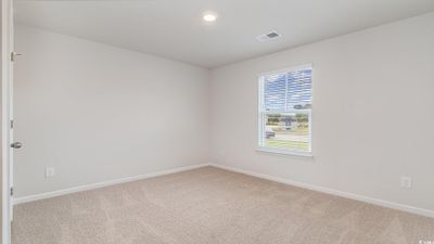 View of carpeted spare room | Image 3