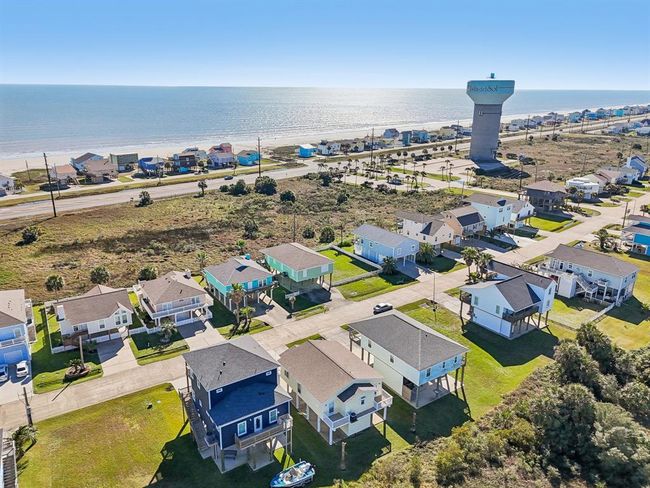 You are just a short walk or golf cart ride to the beach. | Image 23