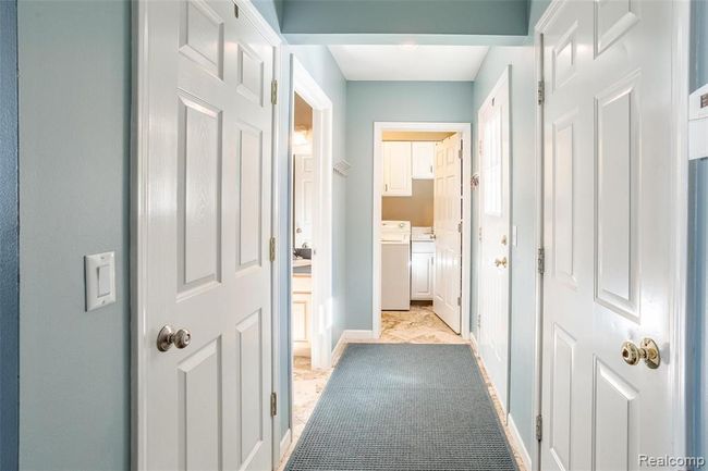 Wallway from Garage to Powder Room & Laundry Room. | Image 24