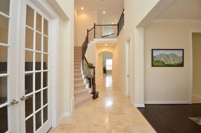 Gorgeous travertine flooring throughout most of the first floor. | Image 6