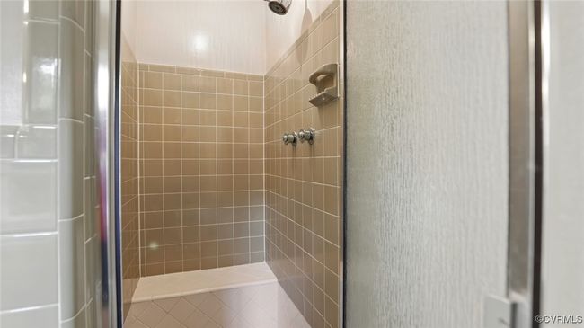 Bathroom featuring a shower stall | Image 23