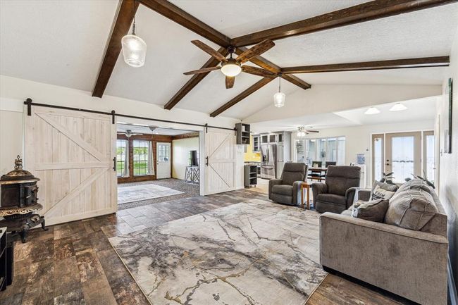 The newly painted light color palette throughout contributes to the airy and spacious feeling of the room, creating a bright and welcoming atmosphere. Light colors reflect natural light, making the room feel larger and more open, while also providing a neutral backdrop for any decor or furnishings | Image 20