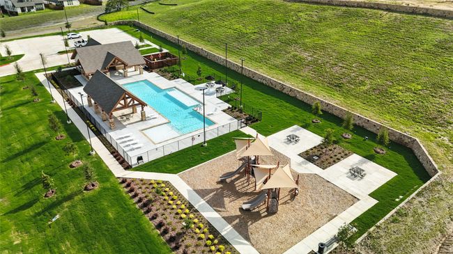 View from above of property with a pool area | Image 30