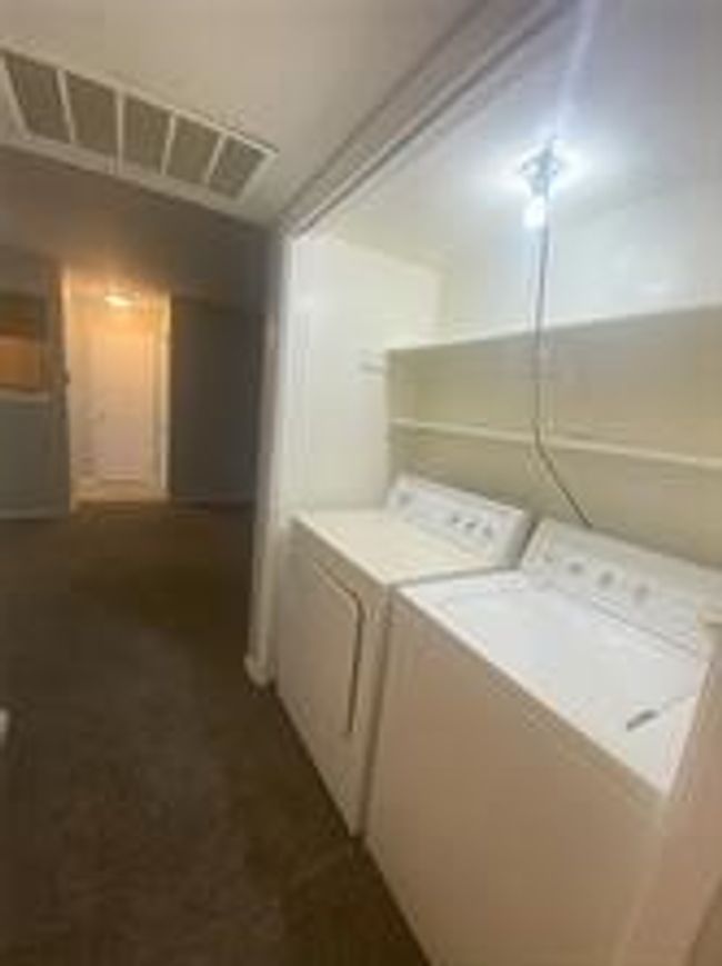 Washroom with separate washer and dryer | Image 13