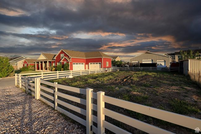 View of front of house with a residential view, an outbuilding, and a pole building | Image 4