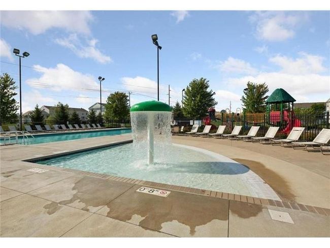 Your assoc fees include full access to the walkable and beautiful Waters Edge Community Center! pool, gym, and party room with kitchen! | Image 21