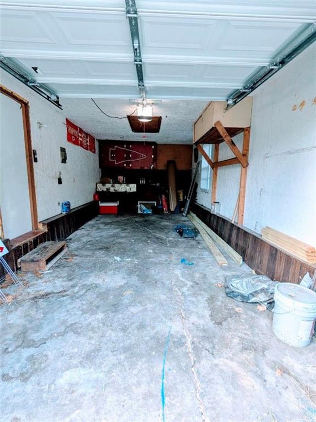 Garage featuring a garage door opener | Image 22