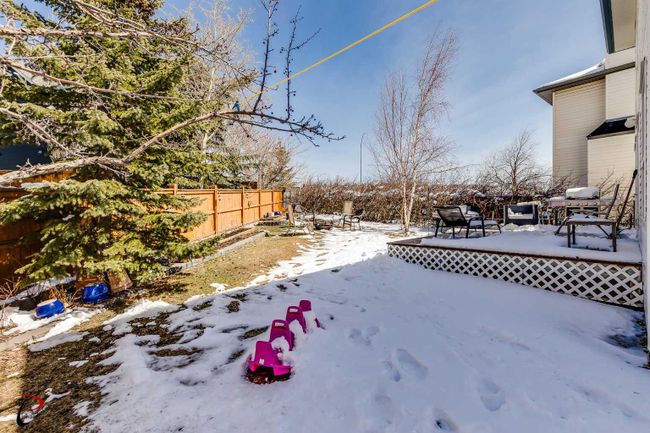 77 Rockbluff Place Nw, Home with 4 bedrooms, 3 bathrooms and 6 parking in Calgary AB | Image 28