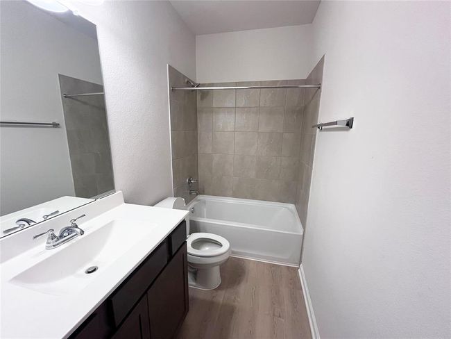 The Cardinal II- Secondary Bathroom. Home under construction. Sample floor plan photo used for illustrative purposes only. Upgrades, selections options, windows and colors may vary. | Image 13