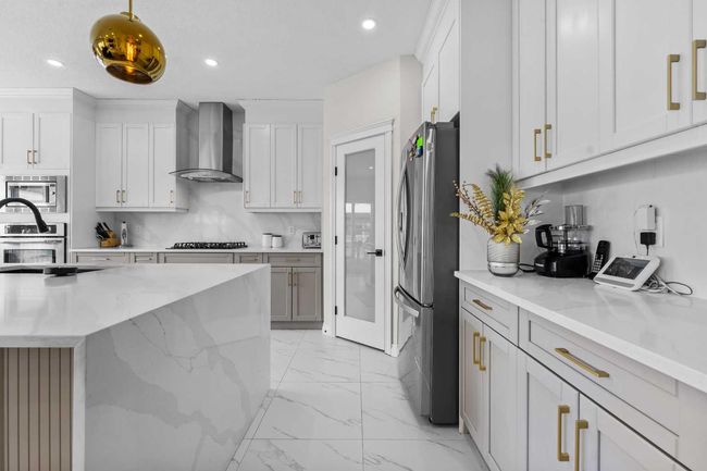316 Kinniburgh Link, House other with 5 bedrooms, 4 bathrooms and 6 parking in Chestermere AB | Image 13