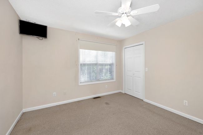 Master bedroom- carpet, ceiling fan | Image 12