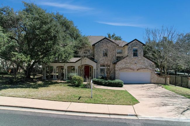 French country style house located two blocks from the top rated schools in Austin. | Image 39