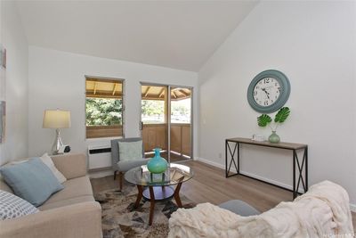 Living area with covered lanai. | Image 3