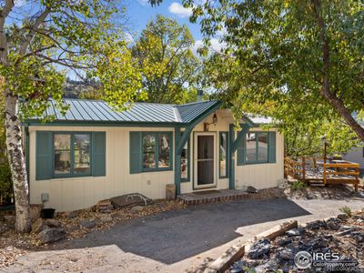 Rare opportunity to live downtown Estes Park on Historic David Hill! Nicely updated and an absolutely darling house! | Image 1