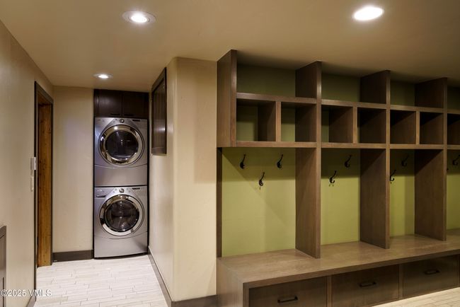 Massive Mudroom with Built-in Cubbies with Washer/Dryer. | Image 44