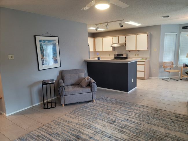 Living room looking into the kitchen | Image 4