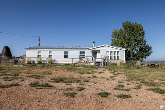 6781 N 9500 E, House other with 4 bedrooms, 3 bathrooms and 10 parking in Lapoint UT | Image 4