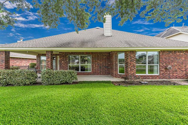 Move-in ready beautiful all brick one story home with quality finishes, energy efficient upgrades and unbeatable setting. | Image 22