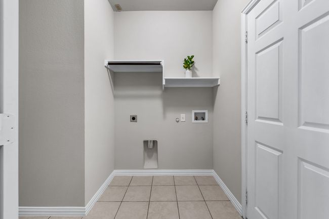 Laundry Room, room for full-size washer and dryer plus addiontal refrigerator | Image 15