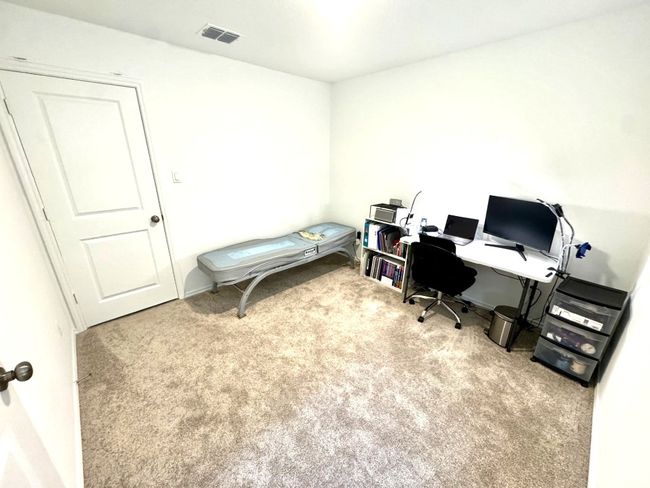Home office featuring carpet flooring | Image 12