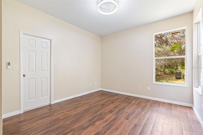 11933 Pasco Trails Blvd, House other with 4 bedrooms, 3 bathrooms and null parking in SPRING HILL FL | Image 26