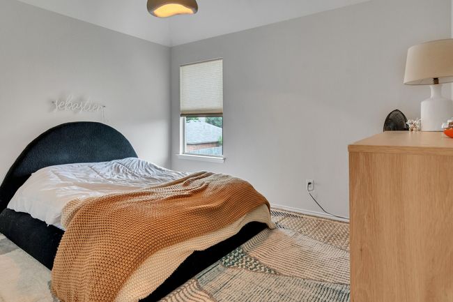 View of carpeted bedroom | Image 25