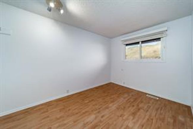 14 - 800 Bowcroft Pl, Home with 3 bedrooms, 1 bathrooms and 1 parking in Cochrane AB | Image 36