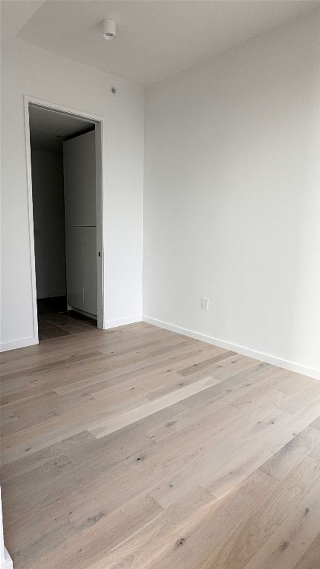 Unfurnished room with light wood finished floors and baseboards | Image 12