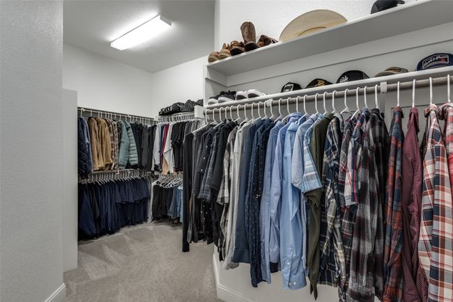 Spacious closet featuring carpet floors | Image 17