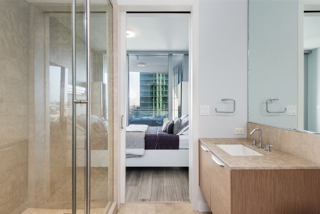 Guest bedroom bathroom with separate shower. | Image 20