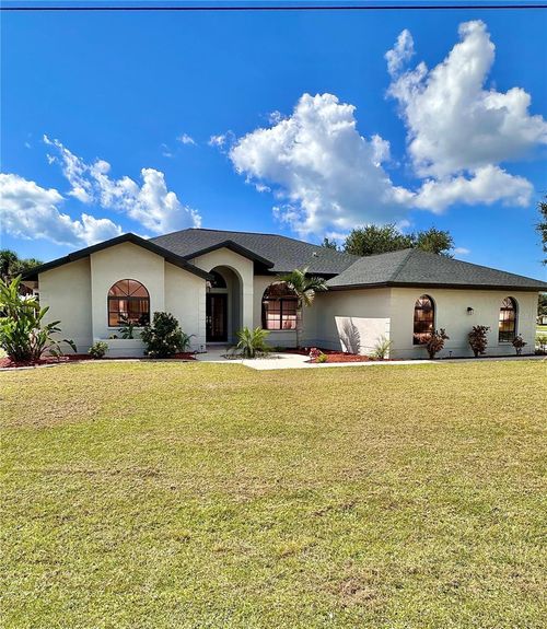 1 Clubhouse Rd, Rotonda West, FL, 33947-2009 | Card Image