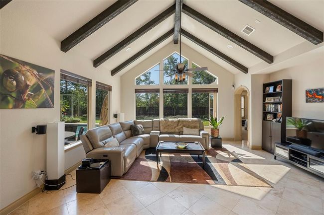 a great view towards the back yard and covered patio and pool area. | Image 18