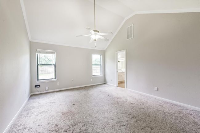 Primary Bedroom with Vaulted ceilings | Image 11