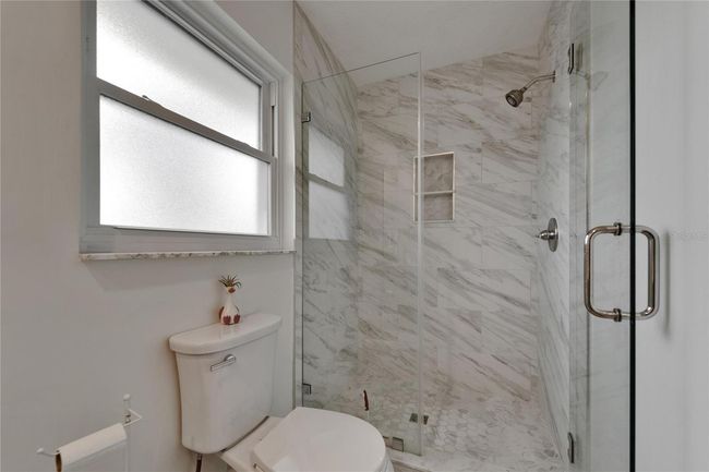 Completely New Shower, tile, door & commode | Image 46
