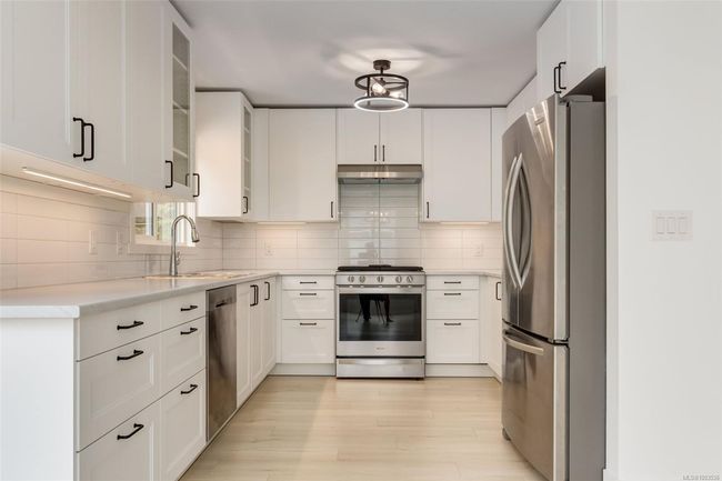 Beautiful kitchen with stainless steel appliances | Image 25