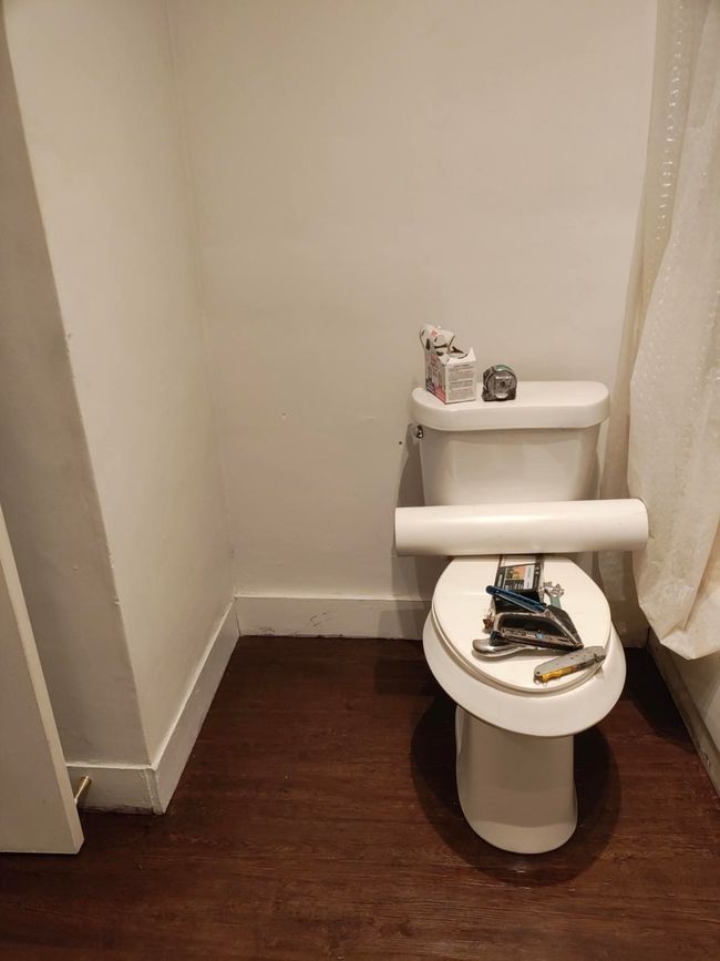 Bathroom with wood finished floors and baseboards | Image 8