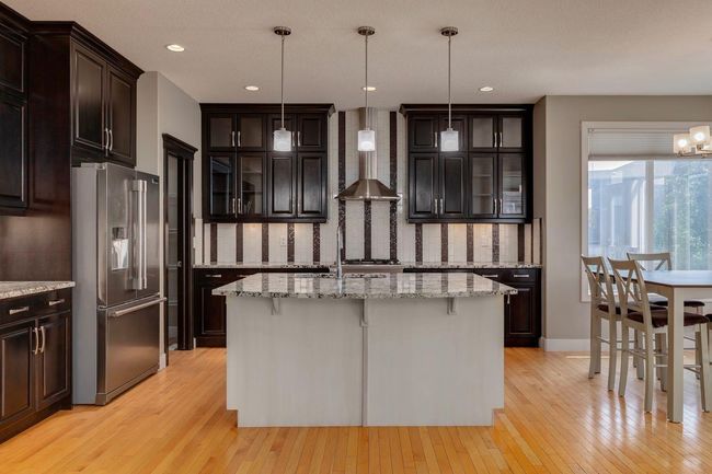 310 Kingsbury View Se, House other with 4 bedrooms, 4 bathrooms and 5 parking in Airdrie AB | Image 9