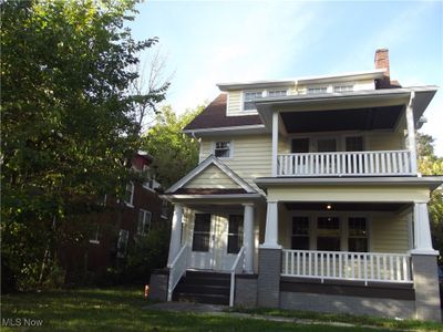 Vinyl sided exterior with porches for summer enjoyment | Image 1